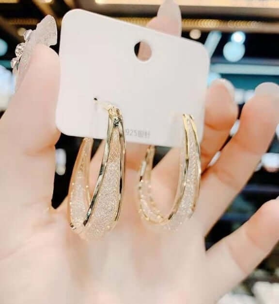 Ressa - עגילי חישוק אליפסה שזורים